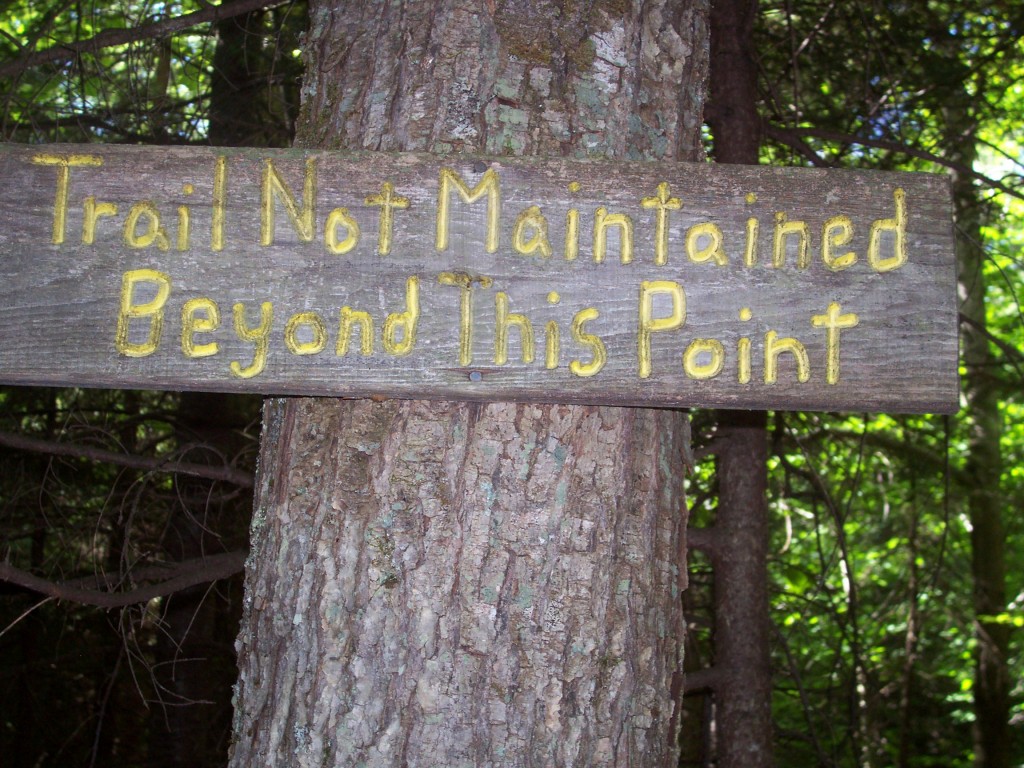 A sign that says "trail not maintained beyond this point"